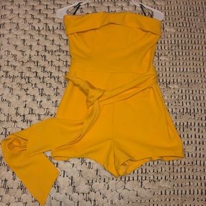 Never worn, yellow romper! Tags still on